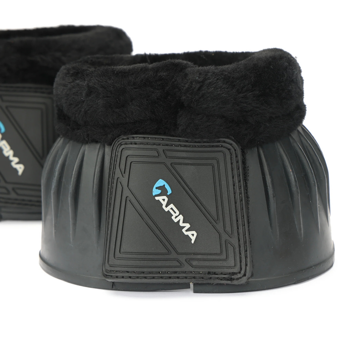 A pair of black ARMA fleece top bell boots with velcro closures.