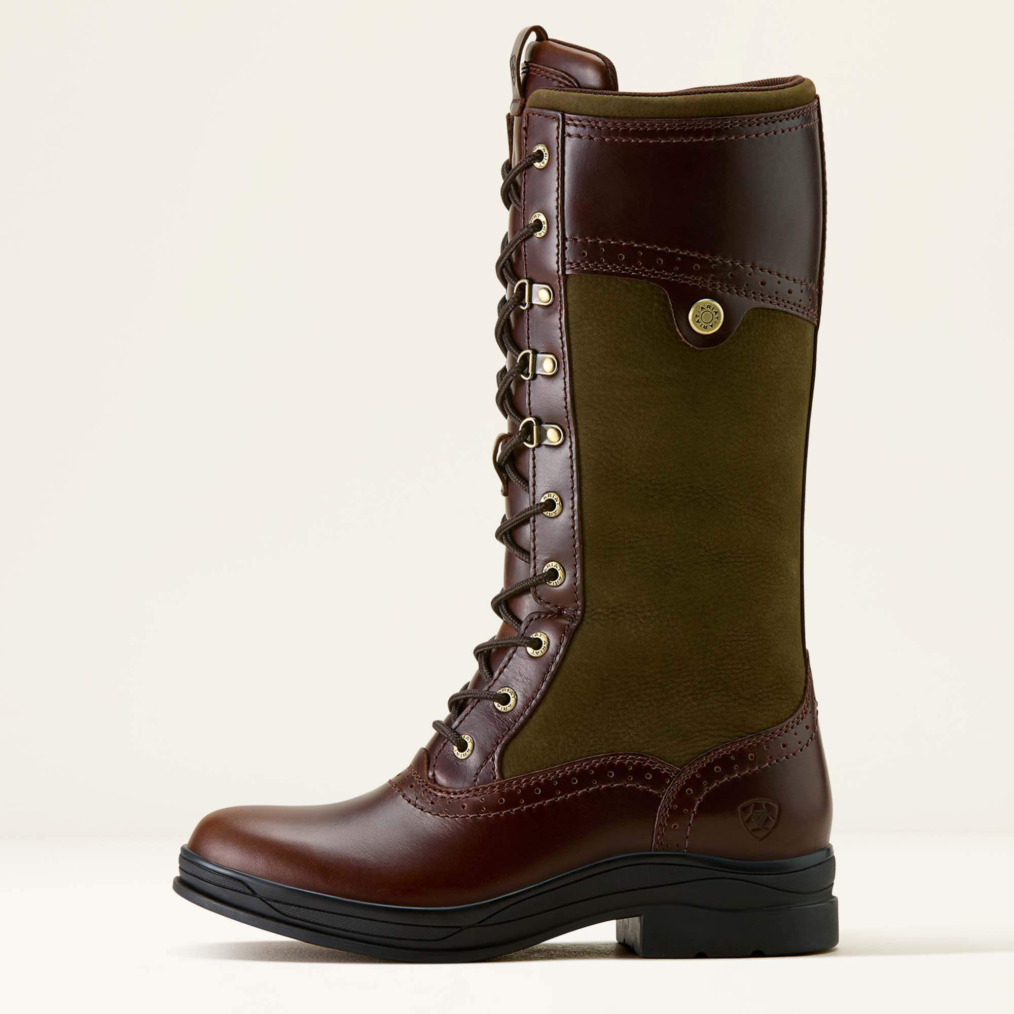 Ariat Wythburn II Waterproof brown and green riding boot with lace-up design on a beige background