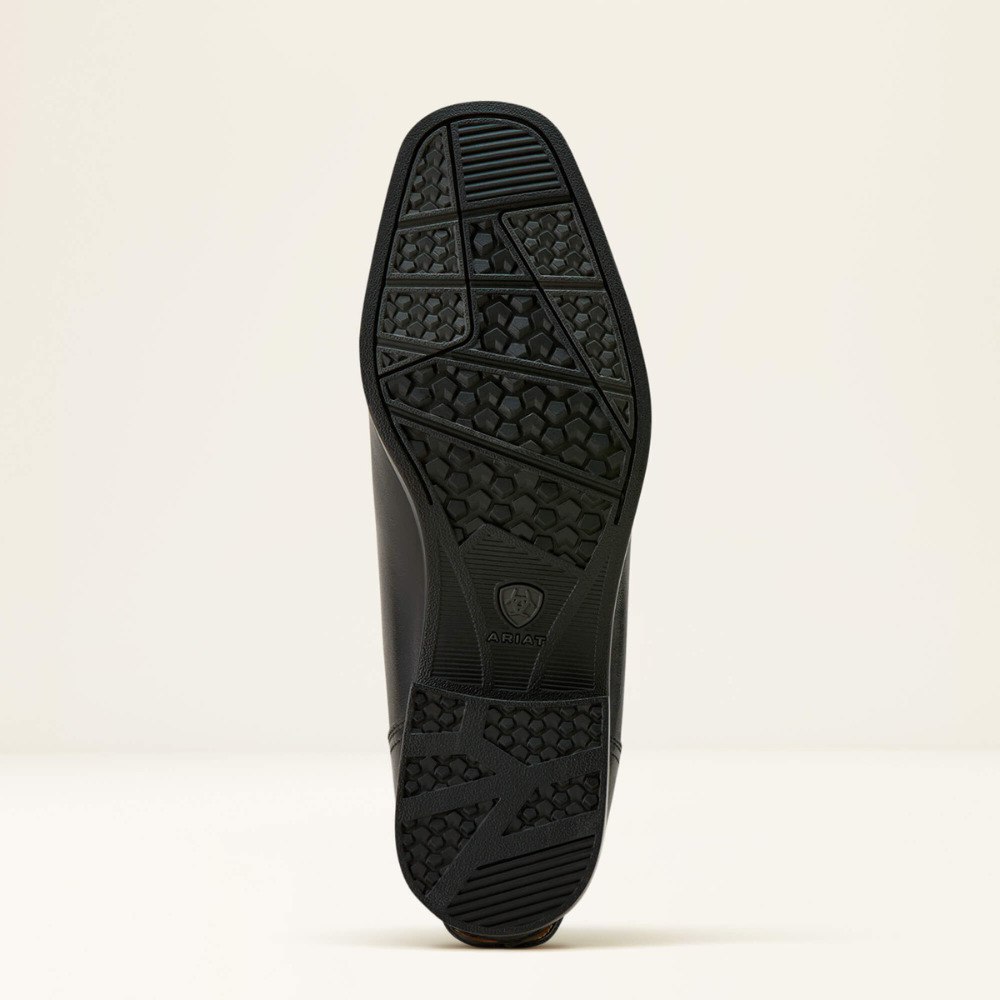 Image of the sole of an Ariat Palisade tall dress riding boot on white background.