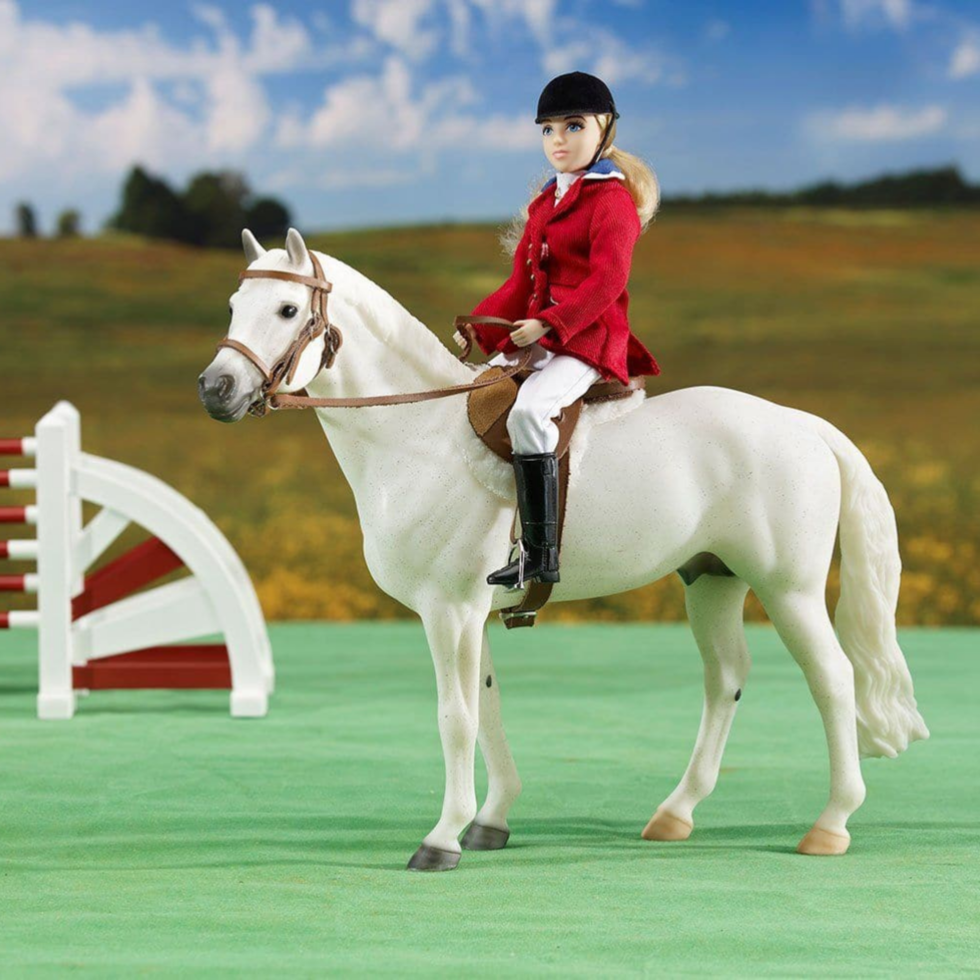 Breyer Hunt Seat Bridle and Saddle on a White Breyer horse.