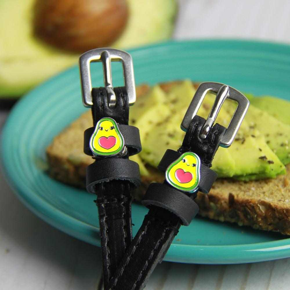 Avacado-themed Mane Jane Happy Avocado Spur Straps.