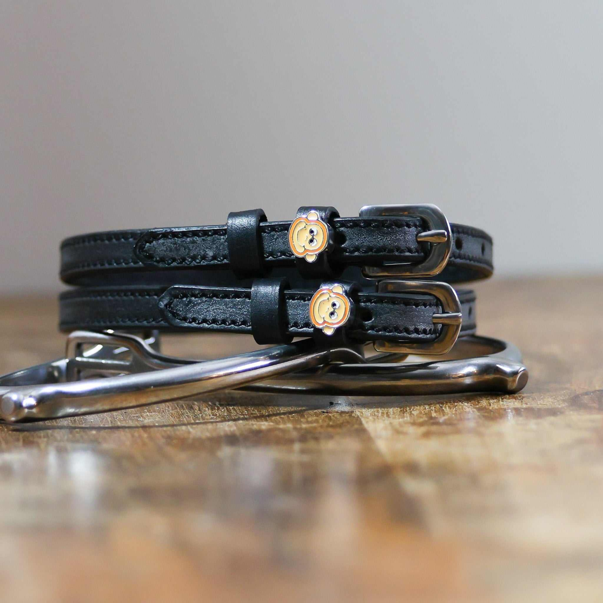Mane Jane monkey face charm spur straps.