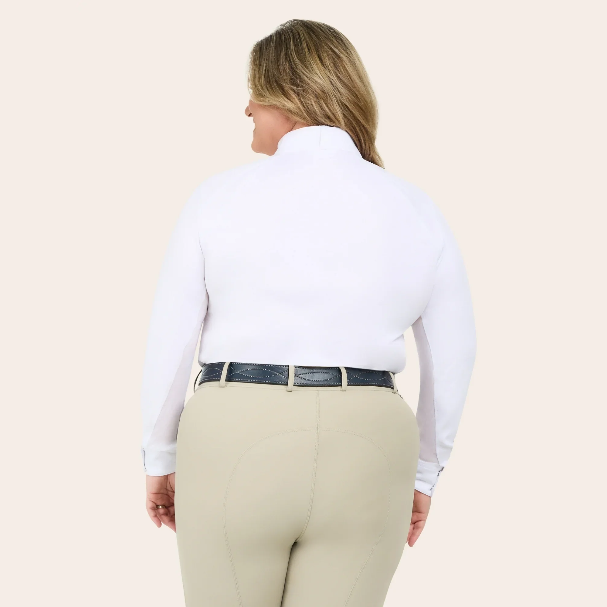 A woman wearing the RJ Classics Sofia Plus Show Shirt in White. Featuring a 1/4 zip with two button collar closure.