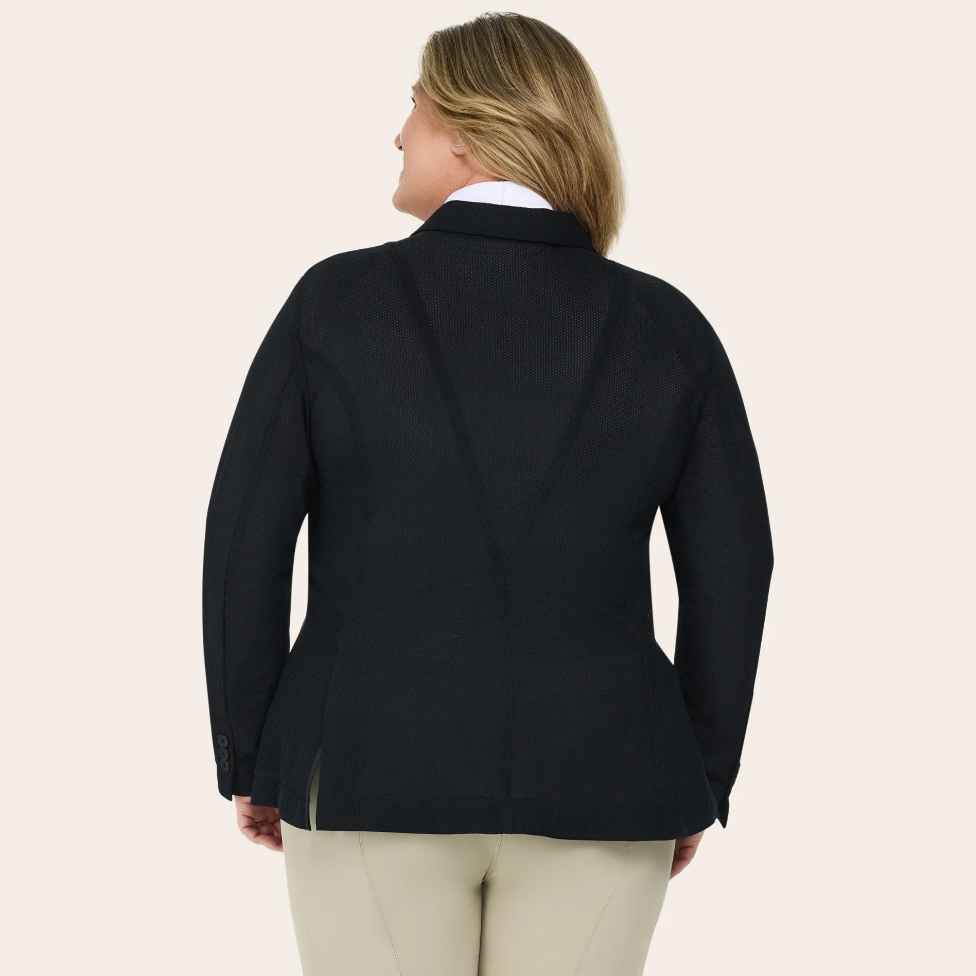 A plus sized model wearing the RJ Classics Plus Mesh Show Coat in Black.