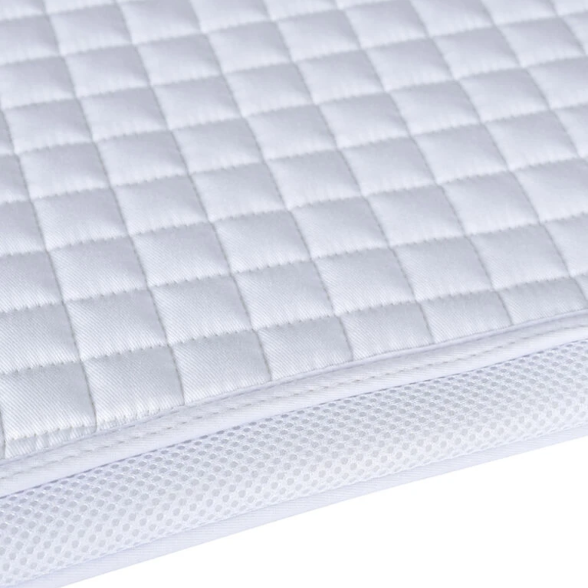 Close up of the quilted Weatherbeeta Air Tec Dressage Pad in White.