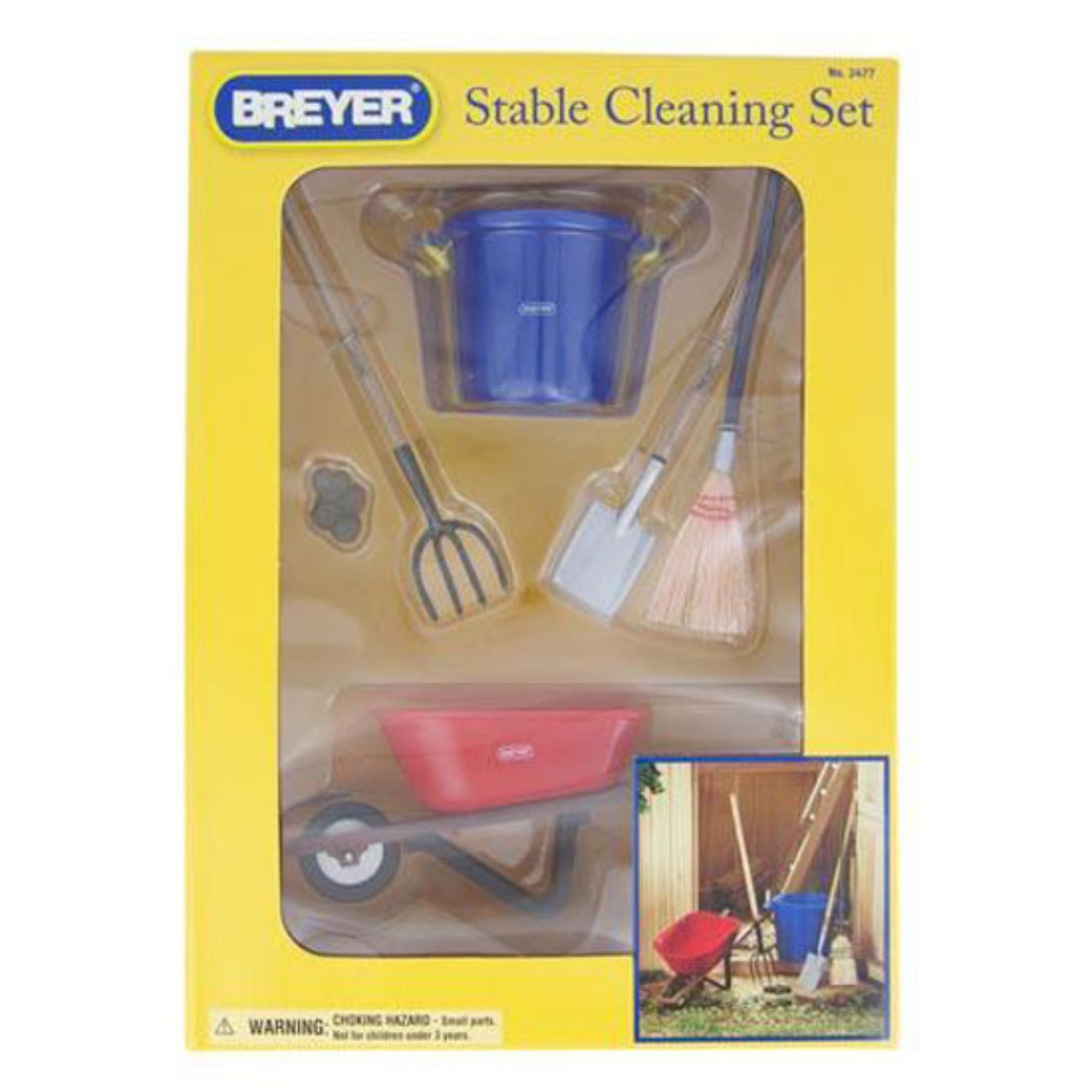 Breyer Horse Stable Cleaning Set that includes a wheelbarrow, pitch fork, shovel, broom, muck bucket and a pile of manure.