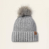 Slate colored Ariat Chiltion knit beanie with a faux fur pom-pom on a beige background