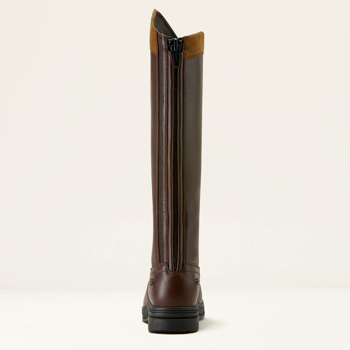 Brown Ariat Stamford Waterproof Boot with a back zipper on a beige background