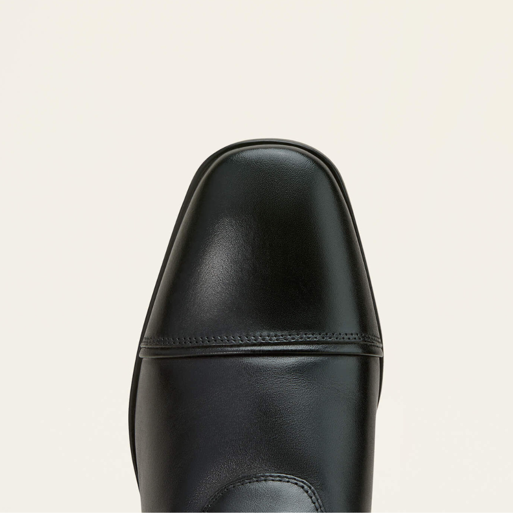 Image of the toe of an Ariat black Palisade tall dress riding boot on a white background.