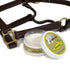 Open container of MOSS Citrus Basil Saddle Soap with a leather bridle on a white background