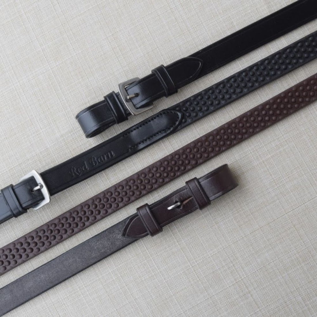 Red Barn Pebble Grip reins with pin ends.