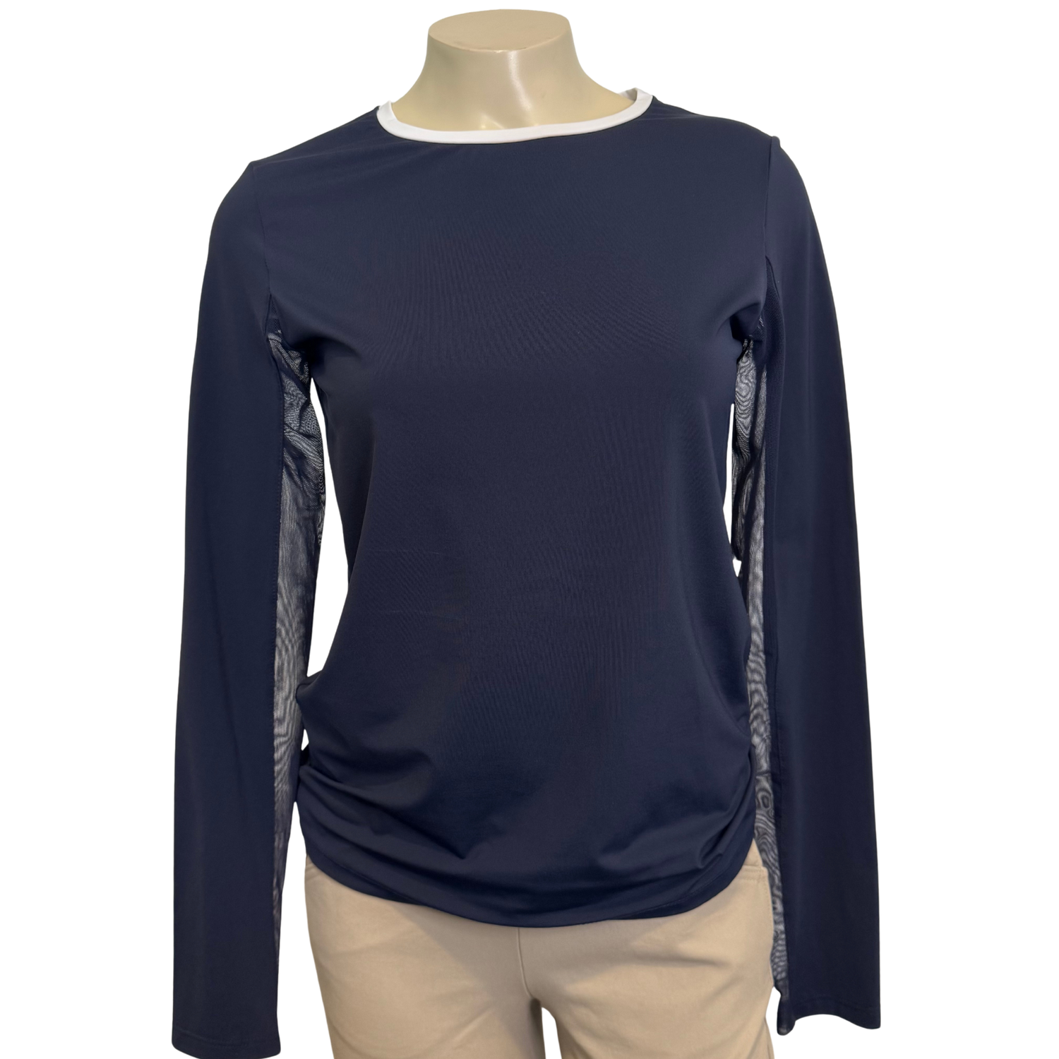 A mannequin wearing a Tailored Sportsman Ice Fil Long Sleeve Crew Neck shirt in Navy with a white neck.