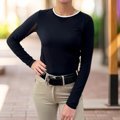 A person wearing a Black Tailored Sportsman Long Sleeve Tee Shirt in Black with a white trim crewneck collar.