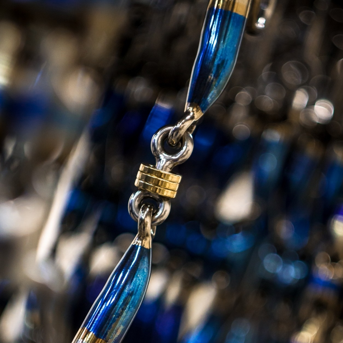 Close up lifestyle image of Trust Equestrian brass ring bit mouthpiece.