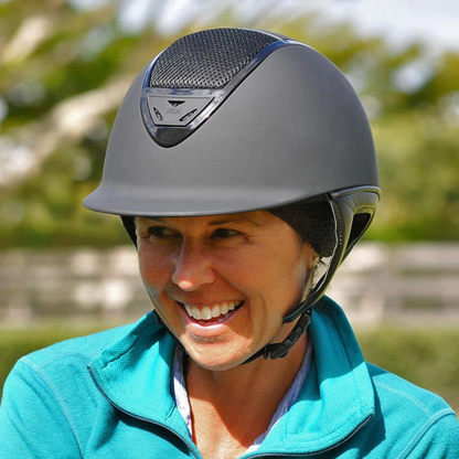 Female rider wearing a matte black with gloss black frame IRH Premium Show Helmet