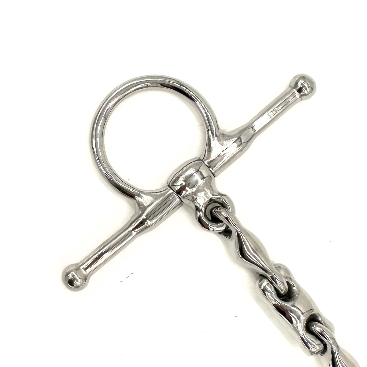 Close up view of the cheekpiece of an AJR Sport Pony Locking Waterford D Bit on a white background. 