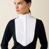 Closeup of a woman wearing a navy Ariat SolVeil Long Sleeve Show Shirt with a white bib front on a beige background .
