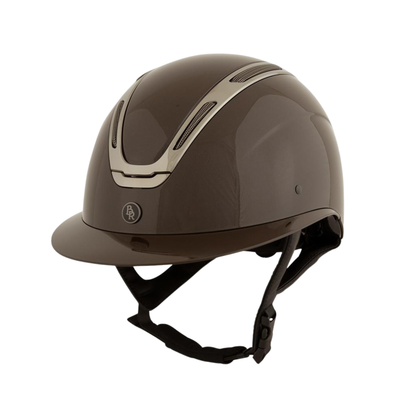 A glossy BR Equesrtian Zeta Serene Shine brown equestrian riding helmet with a gunmetal metallic stripe detail and black chin straps, shown on a plain white background.