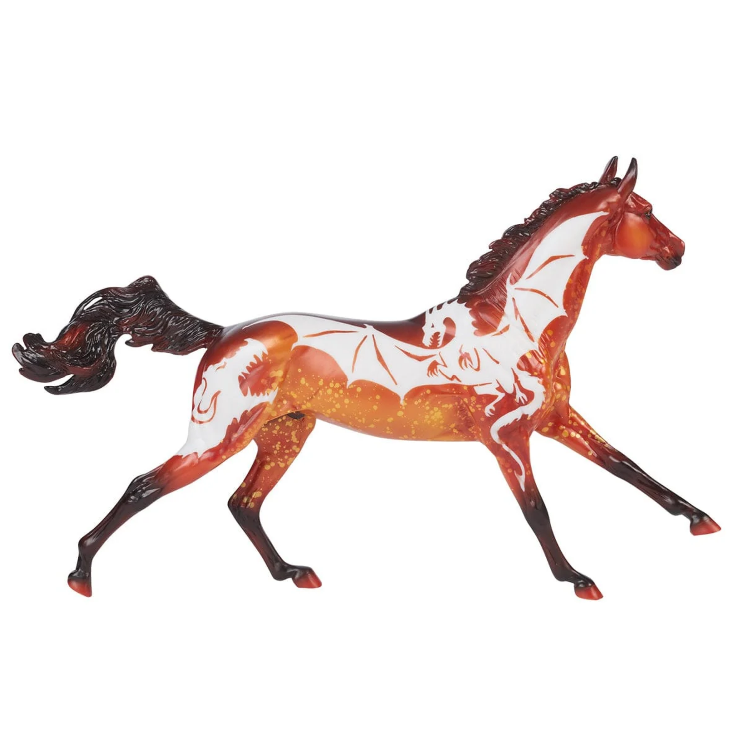 A running horse Breyer model in a translucent amber-orange and white dragon pattern with dark brown to black mane, tail, and legs, shown on a plain white background.