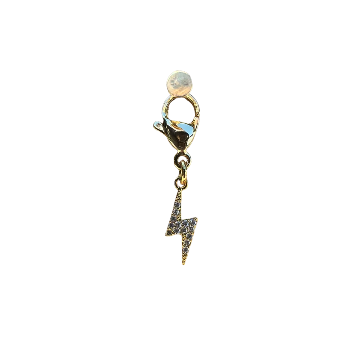 Gold charm with a lightning bolt design on a white background