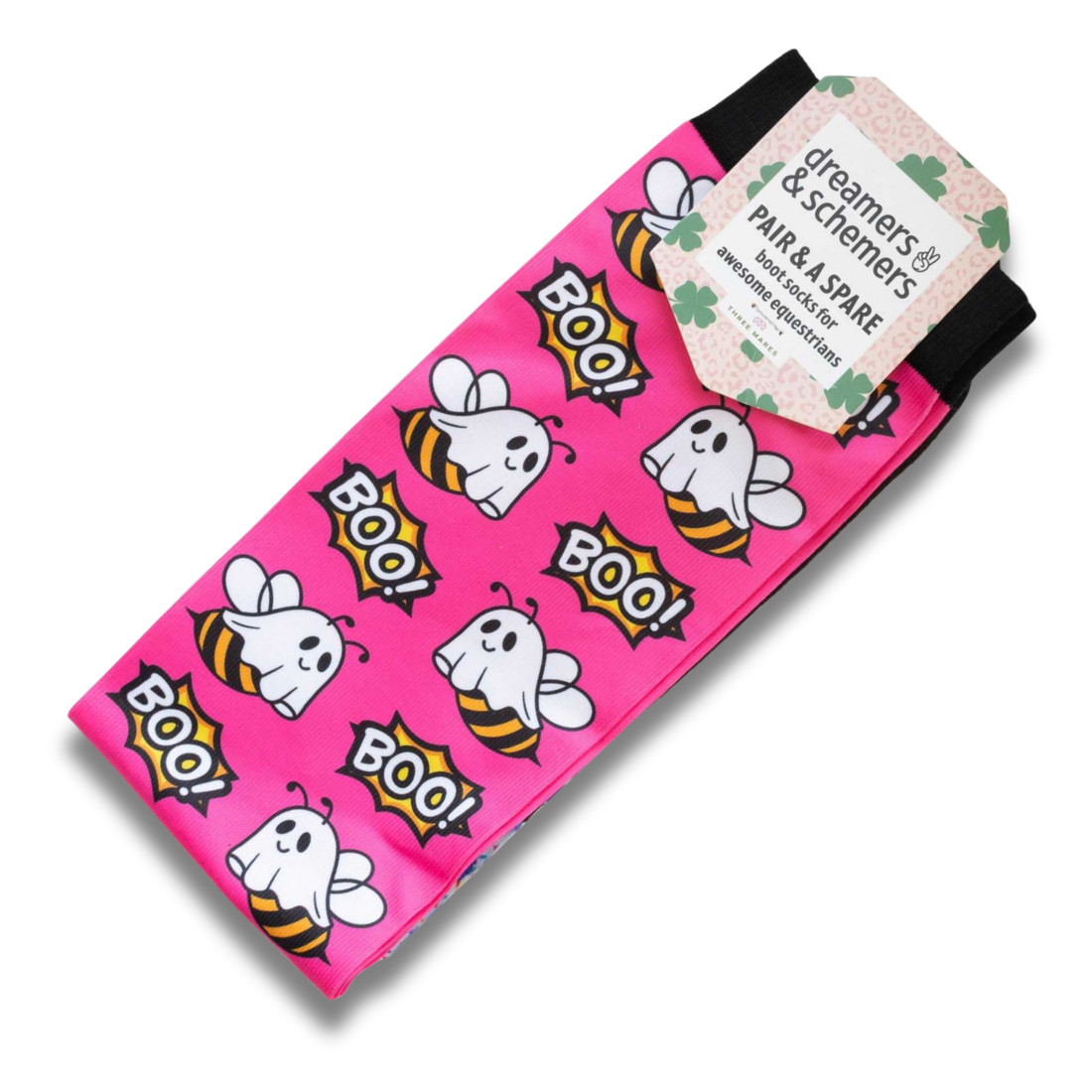 Bright pink Dreamers &amp; Schemers tall boot socks with a Halloween-themed print of cartoon ghosts, bees, and &