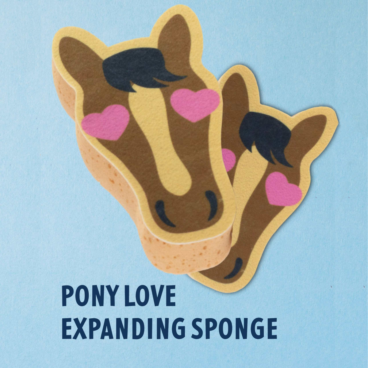 Two layered Dreamers &amp; Schemers novelty sponge bath toppers shaped like stylized pony heads with brown bodies, cream faces, black manes, and pink hearts, shown on a light blue background with the text &