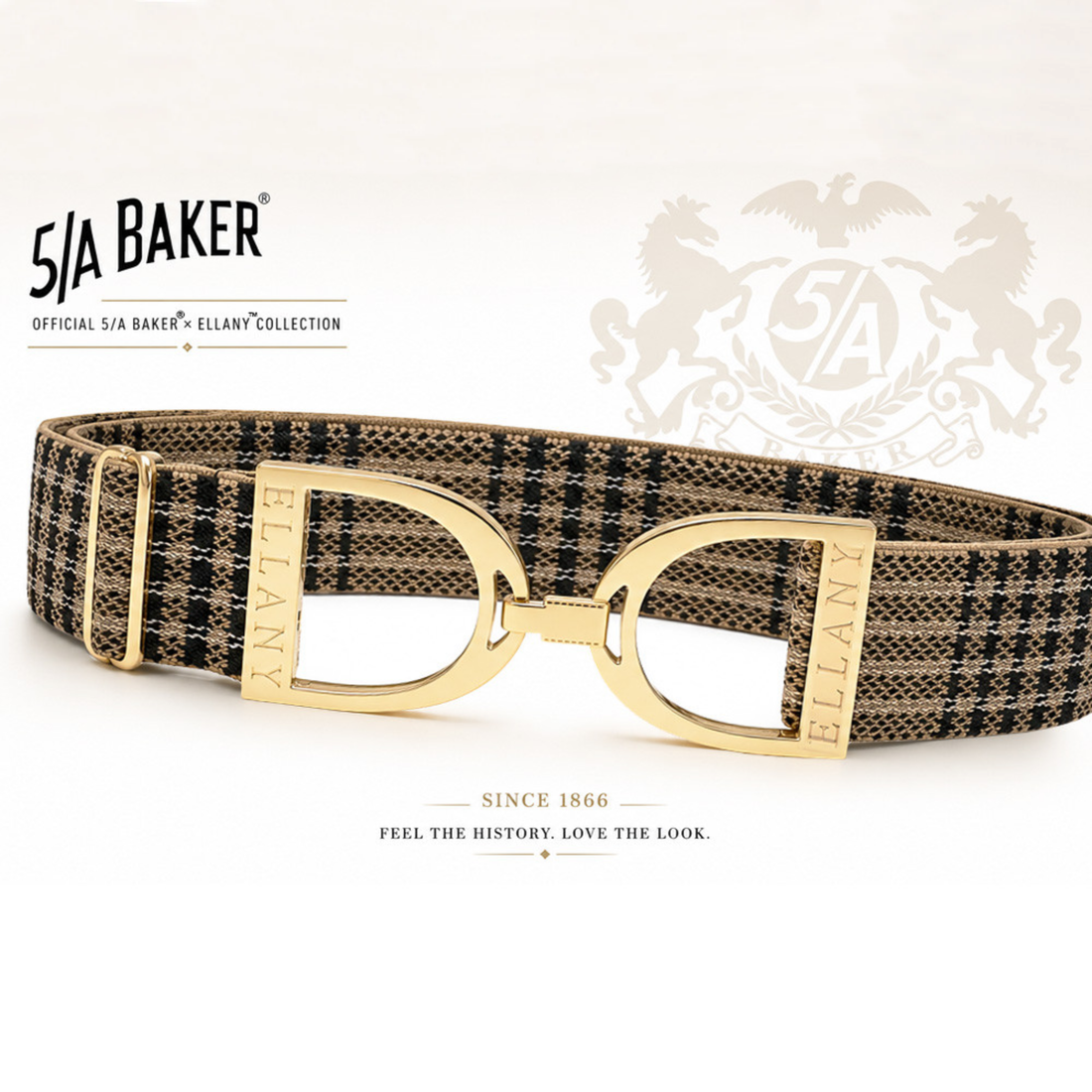 A 5/A Baker x Ellany collection elastic belt with a black and beige plaid pattern and gold metal stirrups buckle, displayed on a clean white background with Baker brand logos.