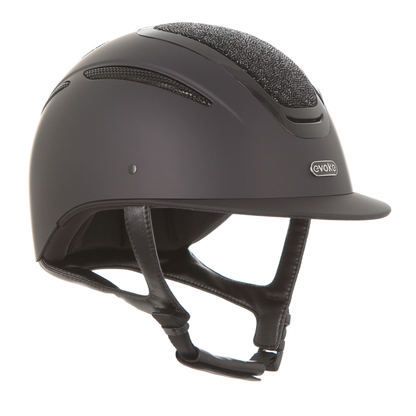 A matte black Evoke Elara Classic Brim equestrian riding helmet with a black jet top panel and black chin straps featuring a small oval logo on the front that reads &
