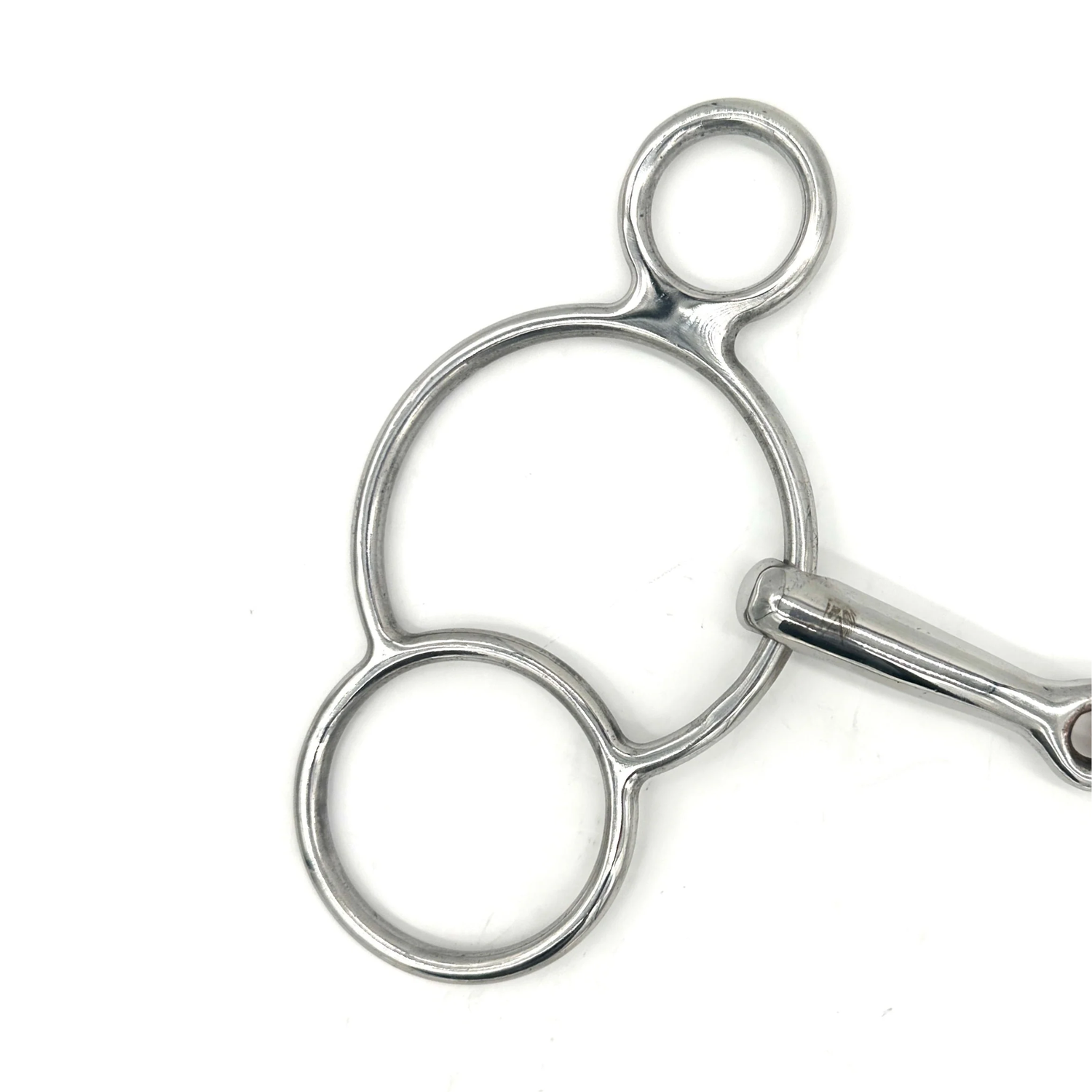 Closeup of the cheekpiece of Jake Adams Equestrian Double Jointed Copper Elliptical Two Ring bit on a white background.