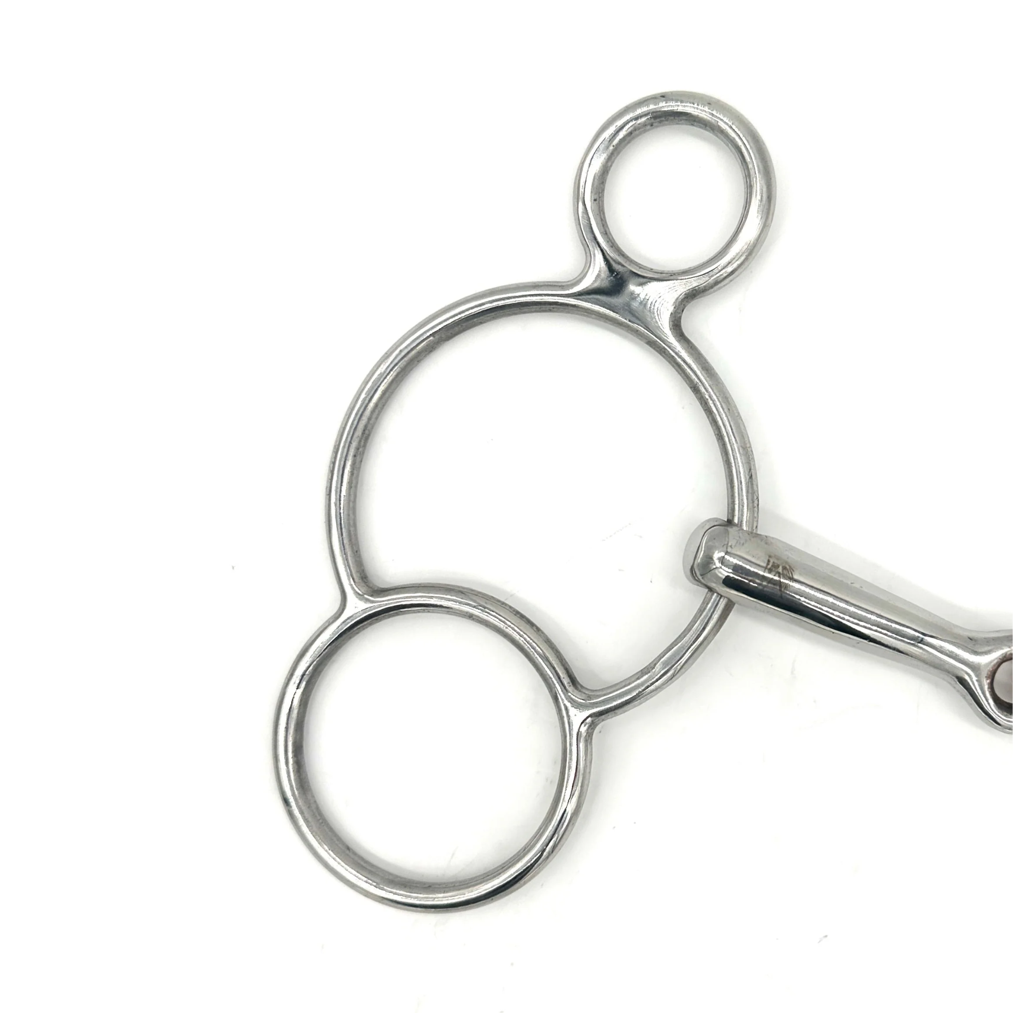 Closeup of the cheekpiece of Jake Adams Equestrian Double Jointed Copper Elliptical Two Ring bit on a white background.