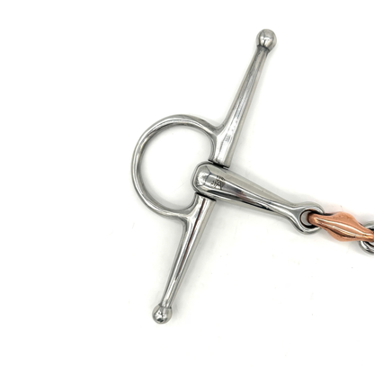 Closeup view of the cheekpiece of a Jake Adams Equestrian Double Jointed Copper Elliptical Full Cheek bit on a white background.