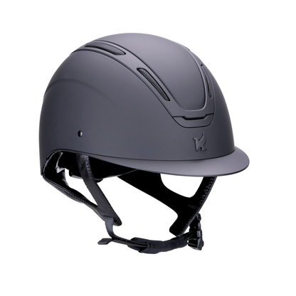 A matte black Karben Amity SMRT equestrian riding helmet with a visor and black chin strap, shown from a three-quarters angle on a solid white background.