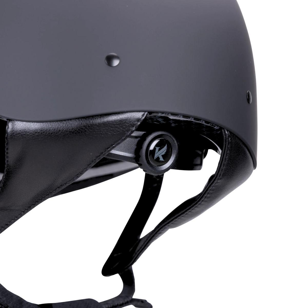 Close up of a black matte Karben Amity SMRT riding helmet&