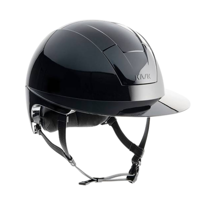 A glossy black KASK Kooki Lady Black Shine equestrian helmet with a matching visor and black chin strap, shown from a three-quarters angle on a white background.