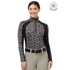 A woman modeling a long-sleeve Kerrits Traverse quarter zip fleece tech top with a beige horse pattern and solid black ribbed sides & under sleeves paired with beige riding pants. A &