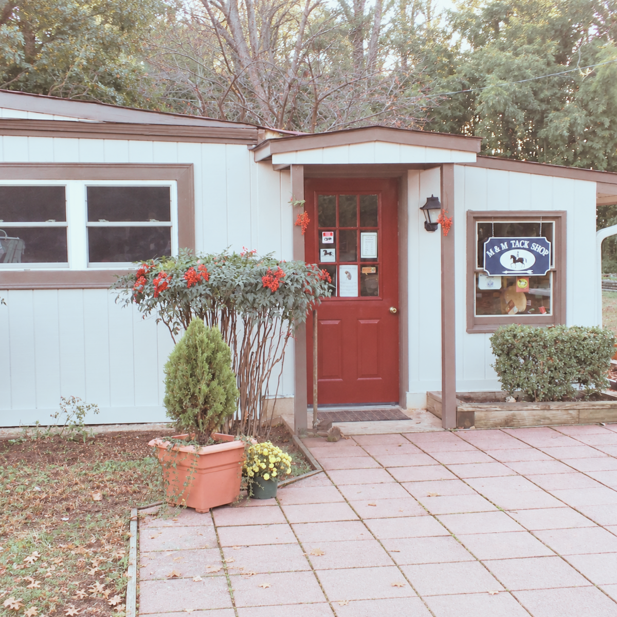 M & M Tack Shop's white house location at MacNair's Country Acres.