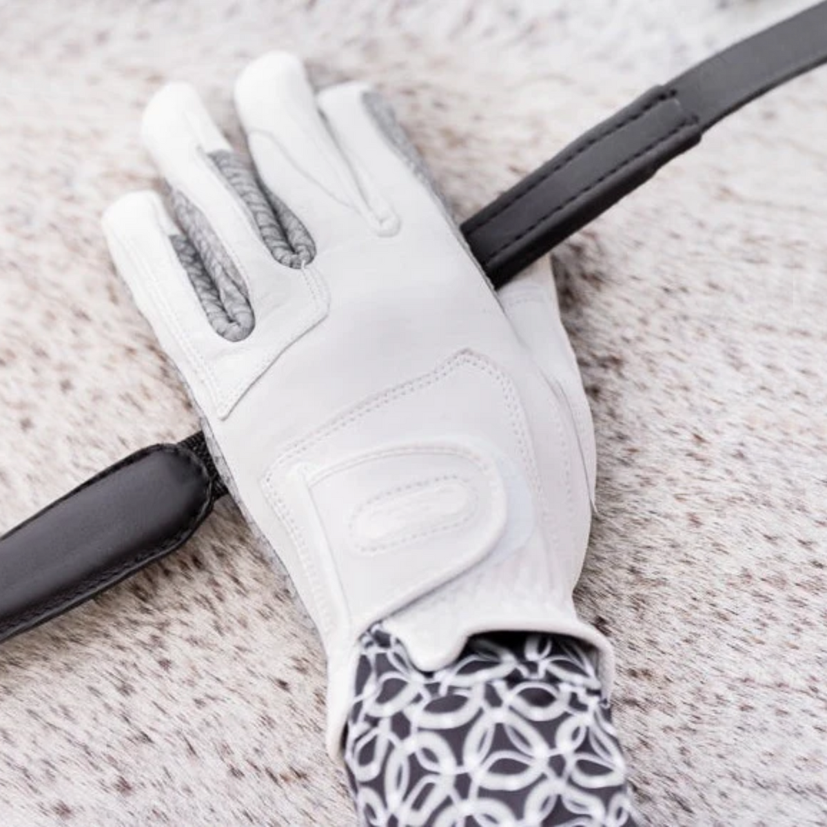 White gloves with grey grips.