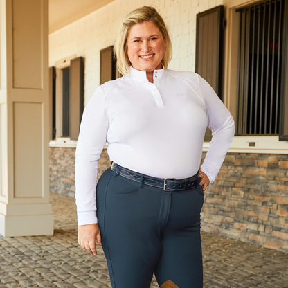 A woman wearing the RJ Classics Sofia Plus Show Shirt in White. Featuring a 1/4 zip with two button collar closure.