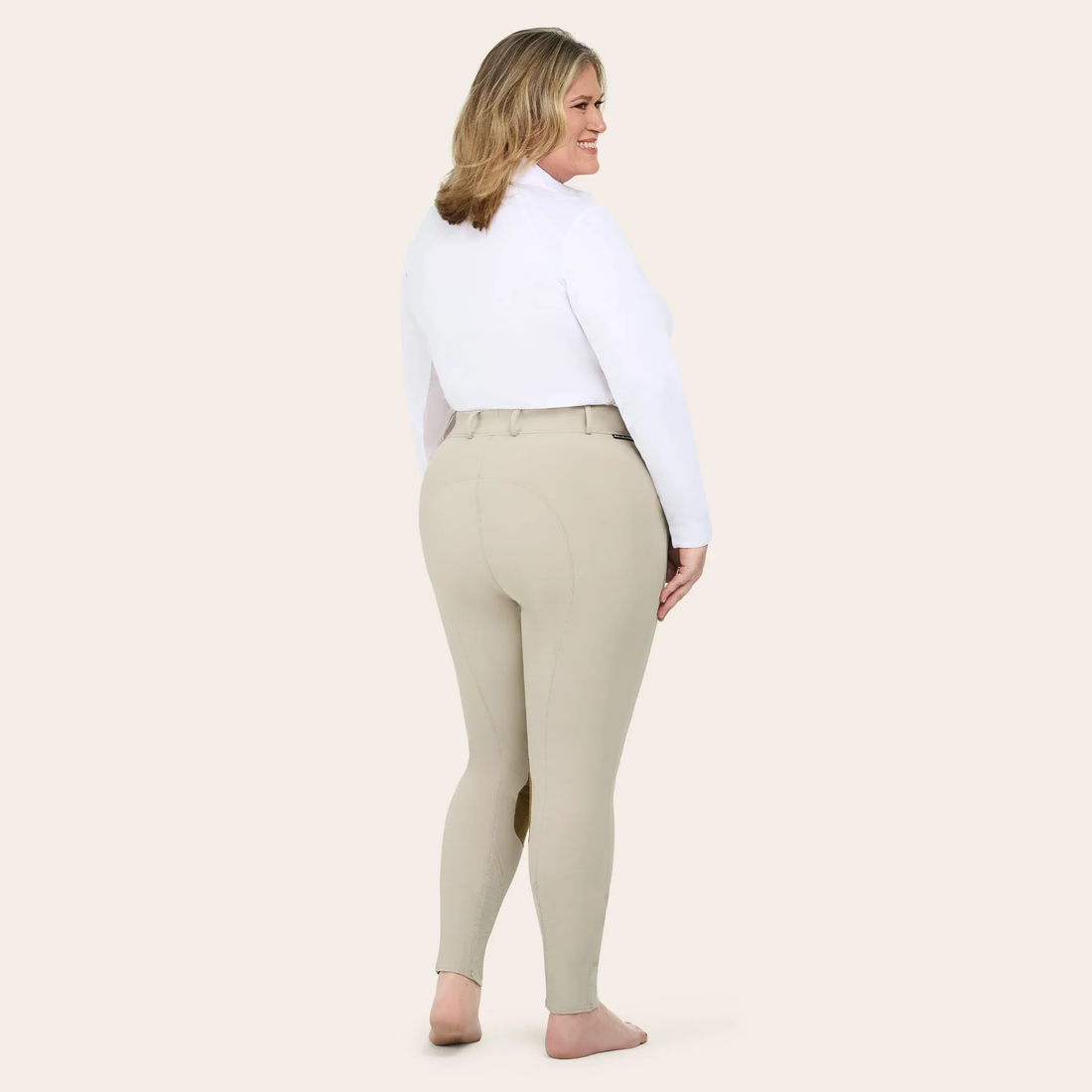A model wearing the RJ Classics Gracie Plus Breech in Sand color.