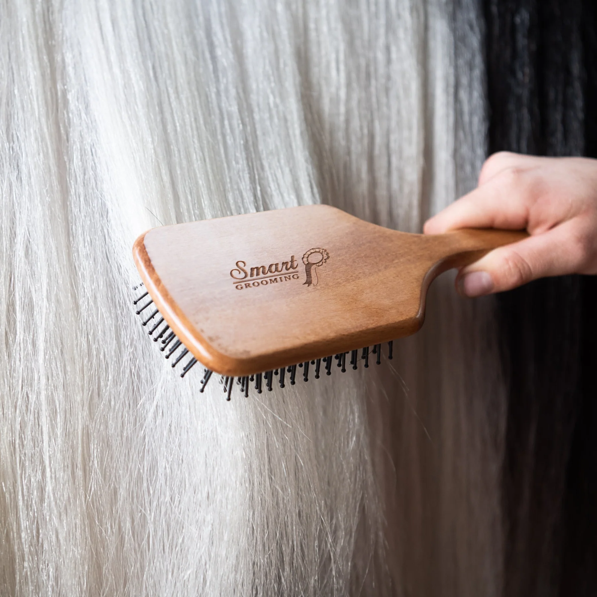 Smart Grooming Large Mane &amp; Tail Brush detangling a horse’s tail.