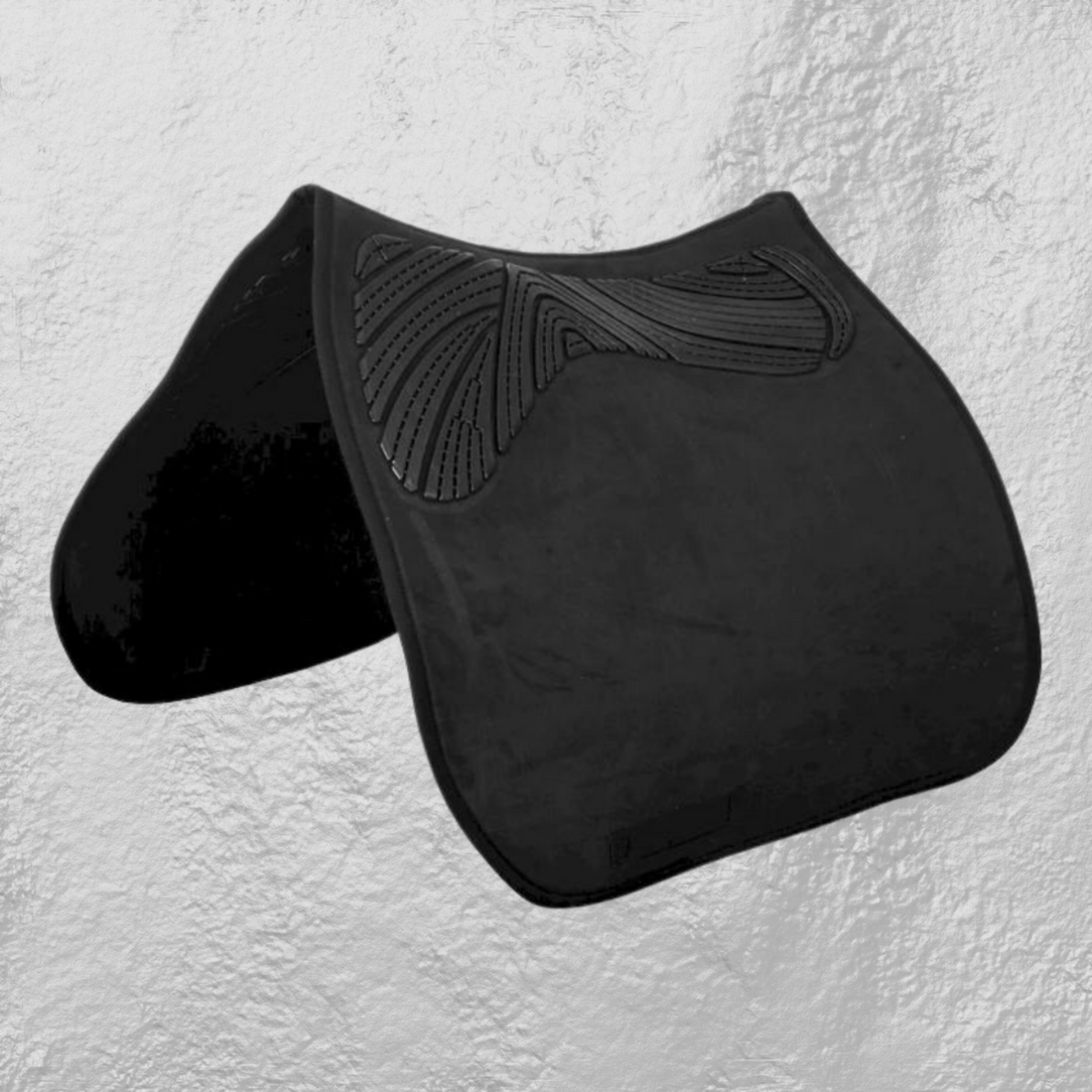 A black dressage saddle pad with Acavallo Gel grip.