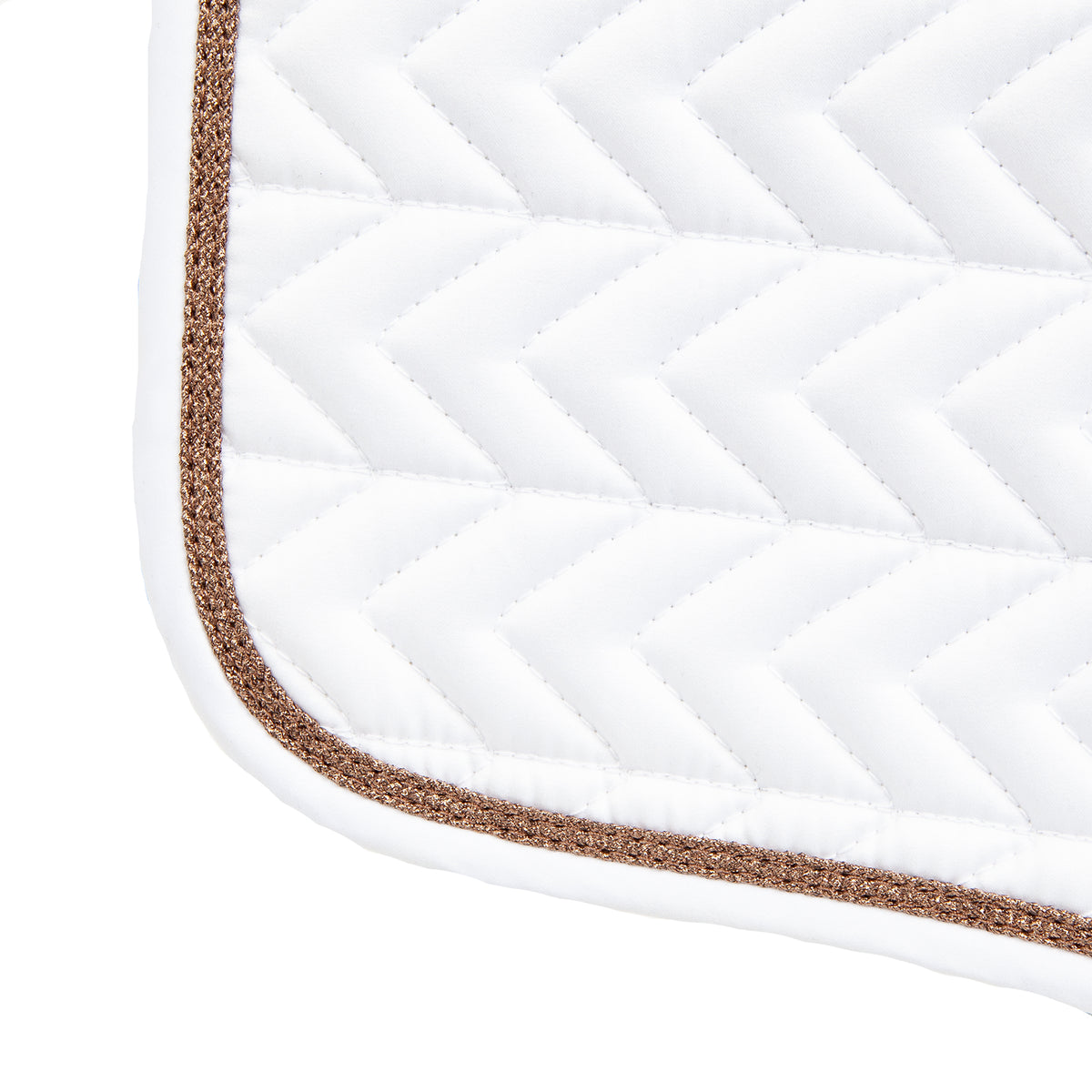 Gold glitter detail on edge of white dressage saddle pad.